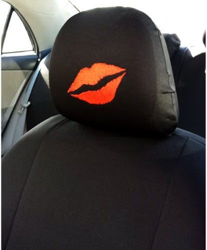 Black Betty Boop Kiss Lip headrest cover installed in a vehicle