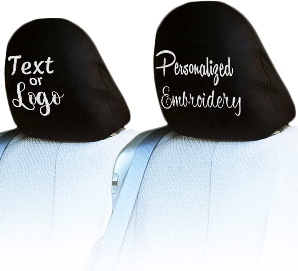 Black personalized embroidery headrest cover installed in truck seat